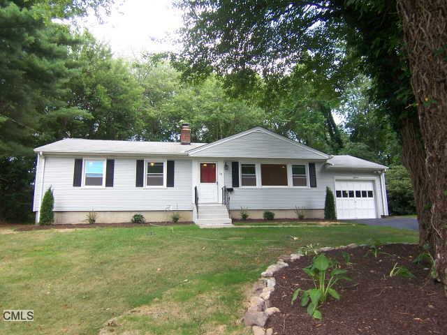 18 Peters Road Trumbull, CT 06611 - Photo 1 of 1 a front view of a house with a garden