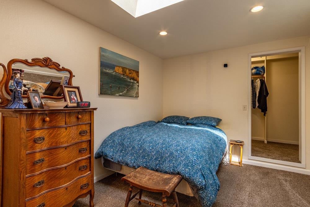 102 Smith Road Watsonville, CA 95076 - Photo 14 of 41 a bedroom with a bed and a window
