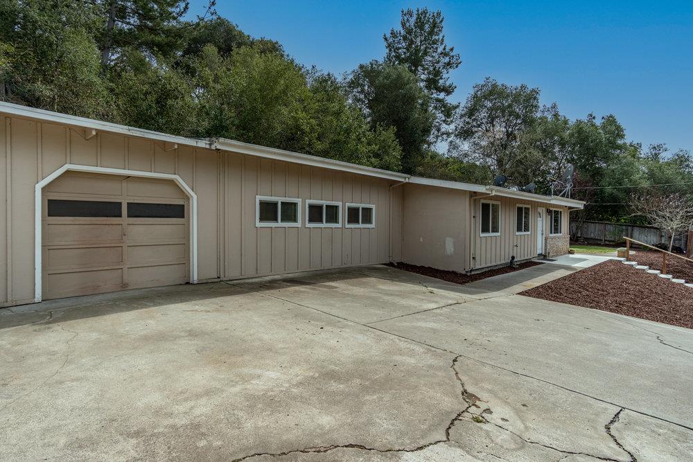 102 Smith Road Watsonville, CA 95076 - Photo 2 of 41 a house with trees in the background