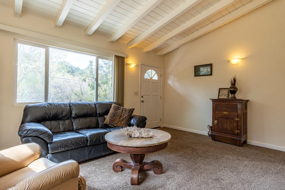 102 Smith Road Watsonville, CA 95076 - Photo 5 of 41 a living room with furniture and a mirror
