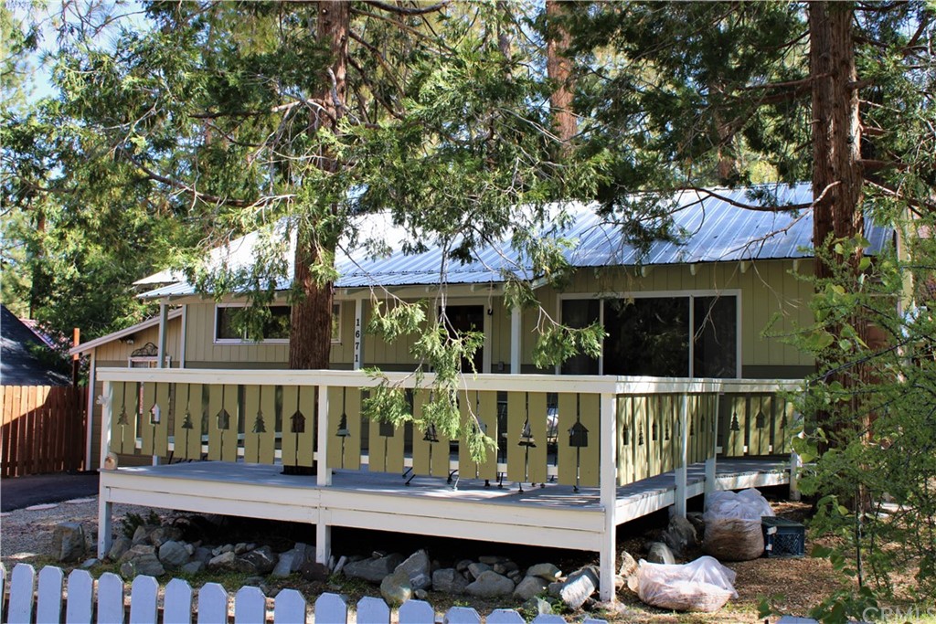 1671 Twin Road Wrightwood, CA 92397 - Photo 1 of 1 a front view of a house with balcony and garden
