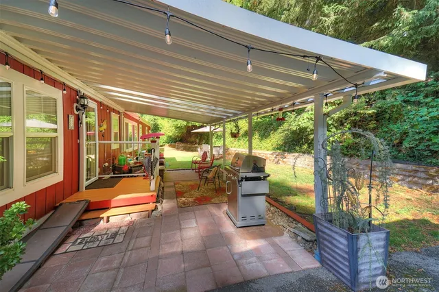a backyard of a house with seating space