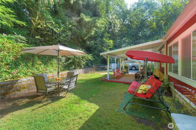 a view of a swimming pool with a patio