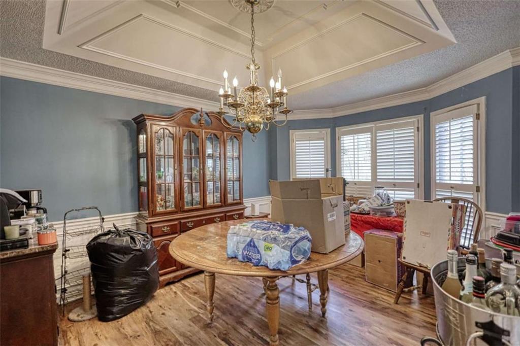 3588 Old Hamilton Mill Road Northeast Buford, GA 30519 - Photo 15 of 49 a view of a dining room with furniture and window