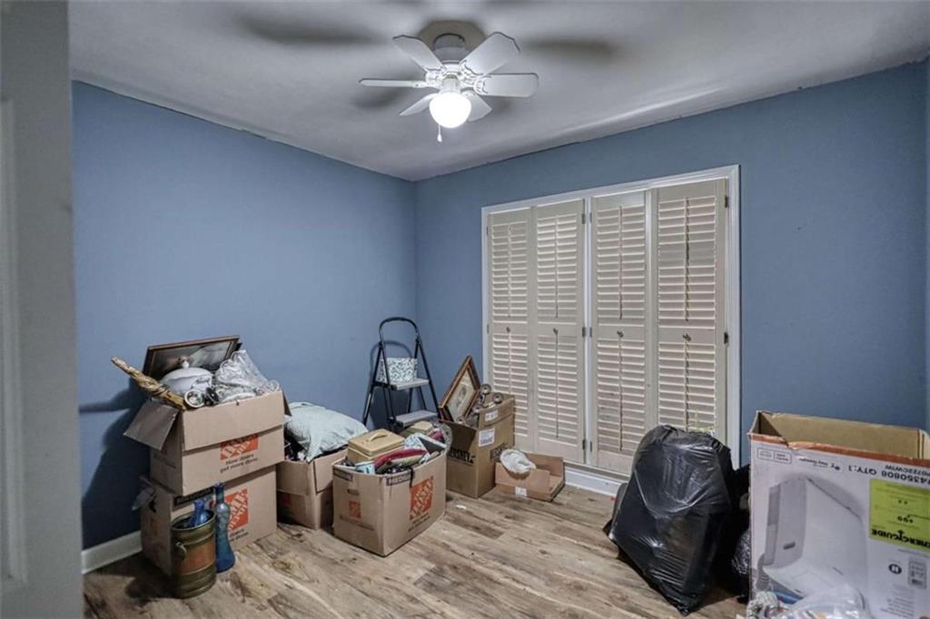 3588 Old Hamilton Mill Road Northeast Buford, GA 30519 - Photo 24 of 49 a room with furniture and a window