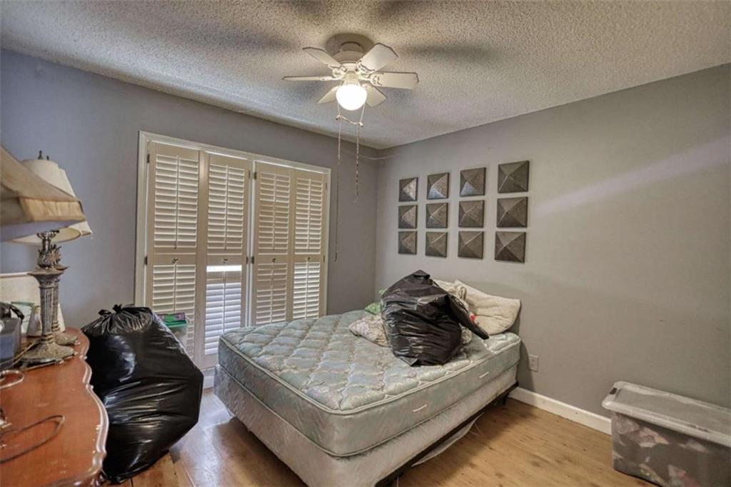 3588 Old Hamilton Mill Road Northeast Buford, GA 30519 - Photo 27 of 49 a living room with furniture and a large window