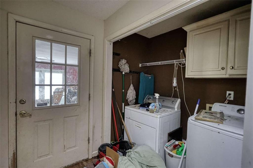 3588 Old Hamilton Mill Road Northeast Buford, GA 30519 - Photo 30 of 49 a room with storage and utility