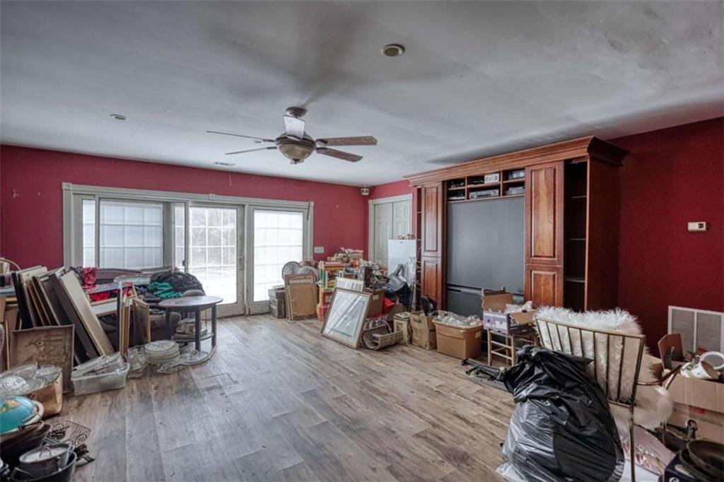 3588 Old Hamilton Mill Road Northeast Buford, GA 30519 - Photo 38 of 49 a view of a livingroom with furniture hardwood floor and furniture