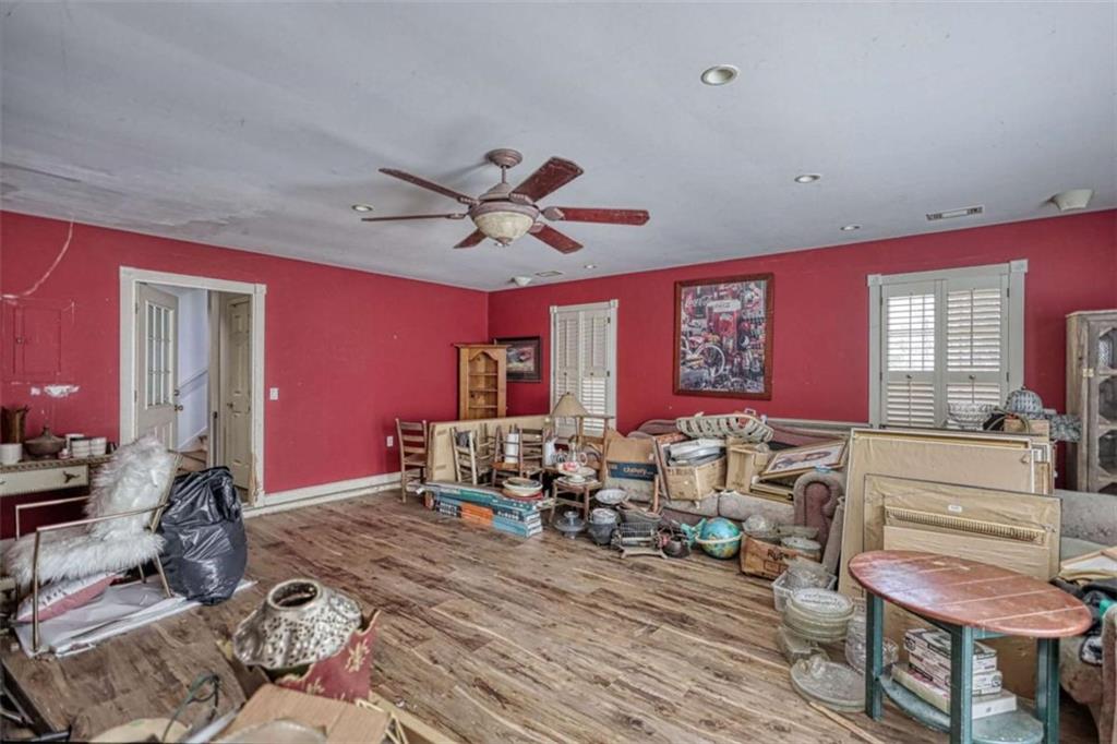 3588 Old Hamilton Mill Road Northeast Buford, GA 30519 - Photo 39 of 49 a view of a livingroom with furniture window and wooden floor
