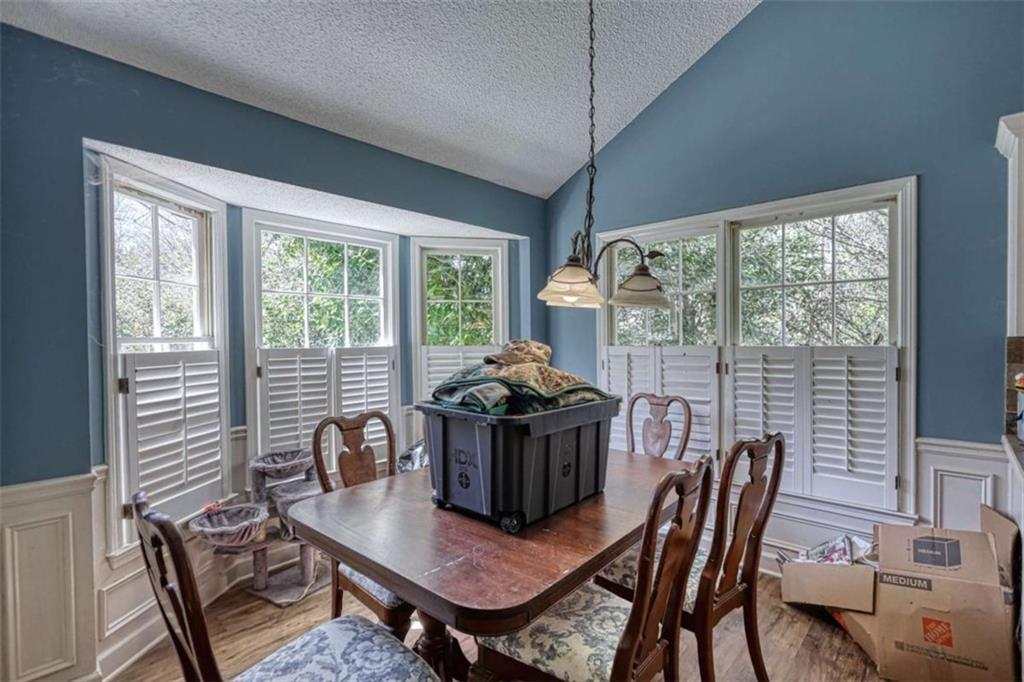 3588 Old Hamilton Mill Road Northeast Buford, GA 30519 - Photo 10 of 49 a view of a dining room with furniture window and outside view