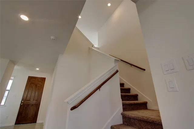 a view of empty room with windows