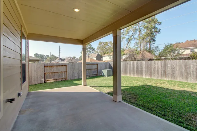 a view of a porch with a backyard