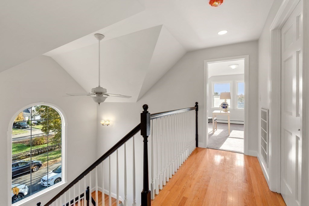 21 Albemarle Road Newton, MA 02460 - Photo 18 of 25 a view of a hallway view with wooden floor and stairs