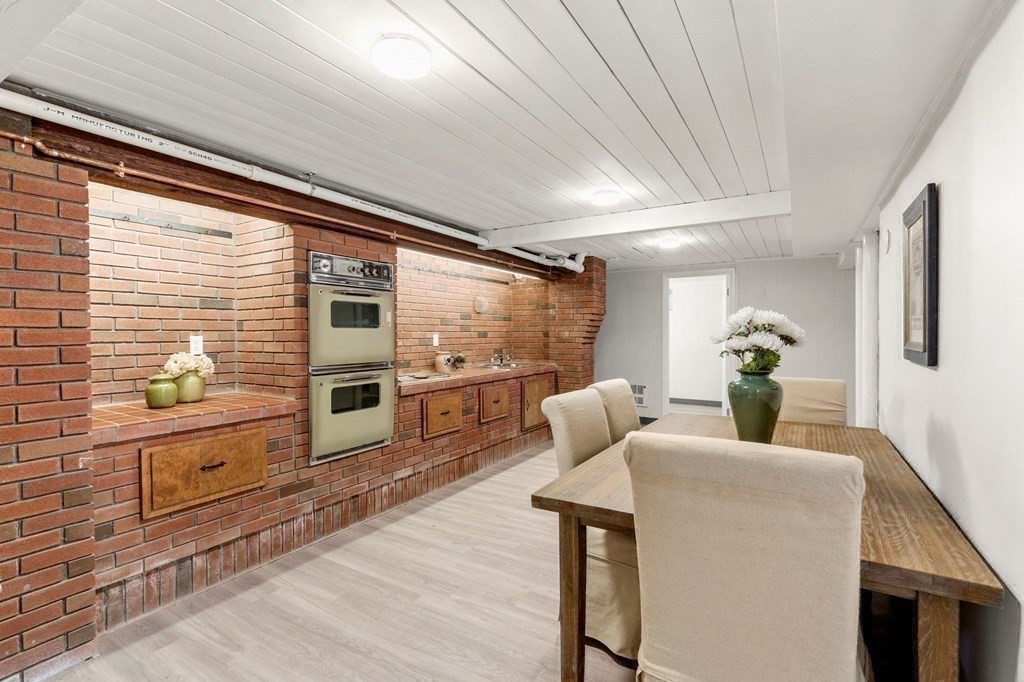 21 Albemarle Road Newton, MA 02460 - Photo 21 of 25 a dining room with furniture and wooden floor