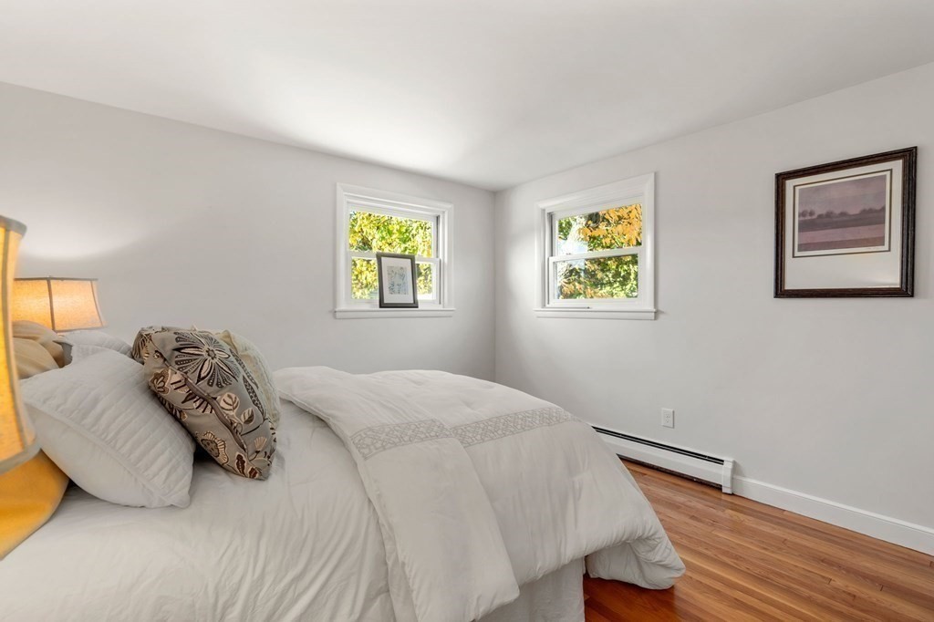 21 Albemarle Road Newton, MA 02460 - Photo 8 of 25 a bedroom with a bed and a window