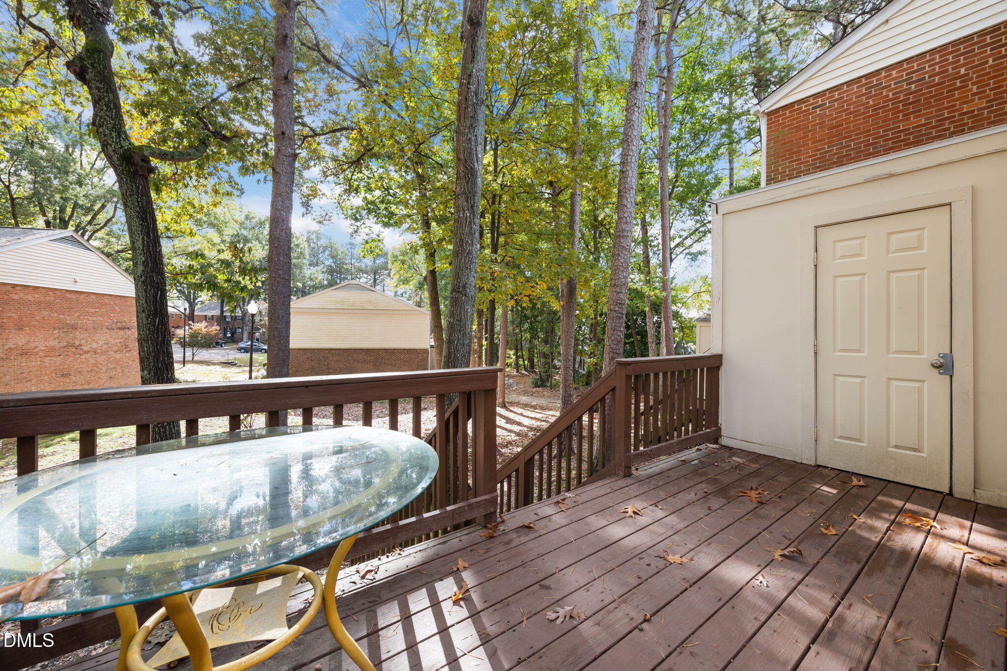 6423 New Market Way Raleigh, NC 27615 - Photo 24 of 33 a view of a wooden deck