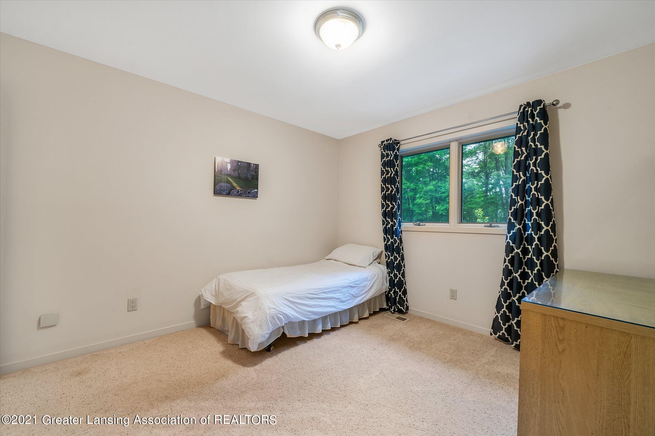 442 Shoesmith Road Haslett, MI 48840 - Photo 26 of 48 (25) UPPER LEVEL Bedroom 3