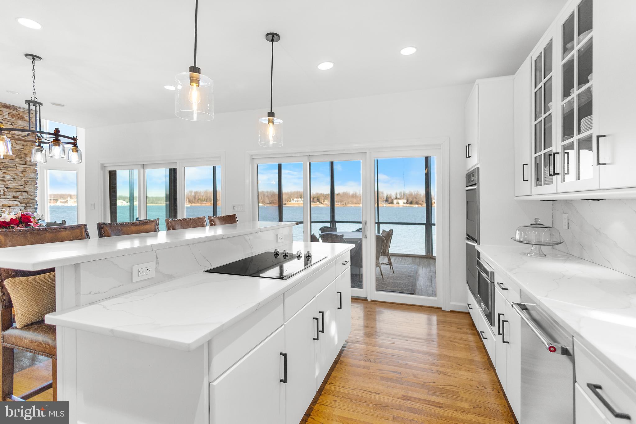 610 South River Landing Road Edgewater, MD 21037 - Photo 11 of 39 a large white kitchen with a large window