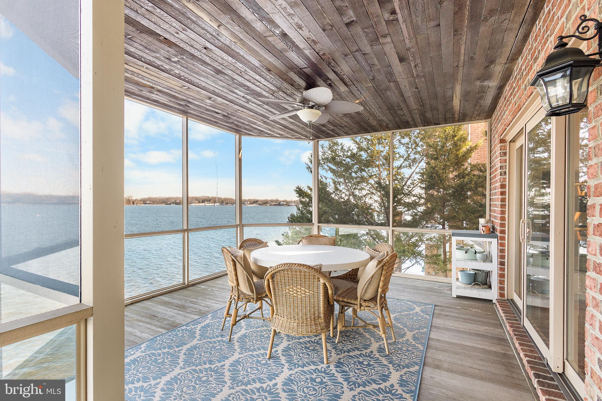 610 South River Landing Road Edgewater, MD 21037 - Photo 13 of 39 a dining room with furniture water view and balcony