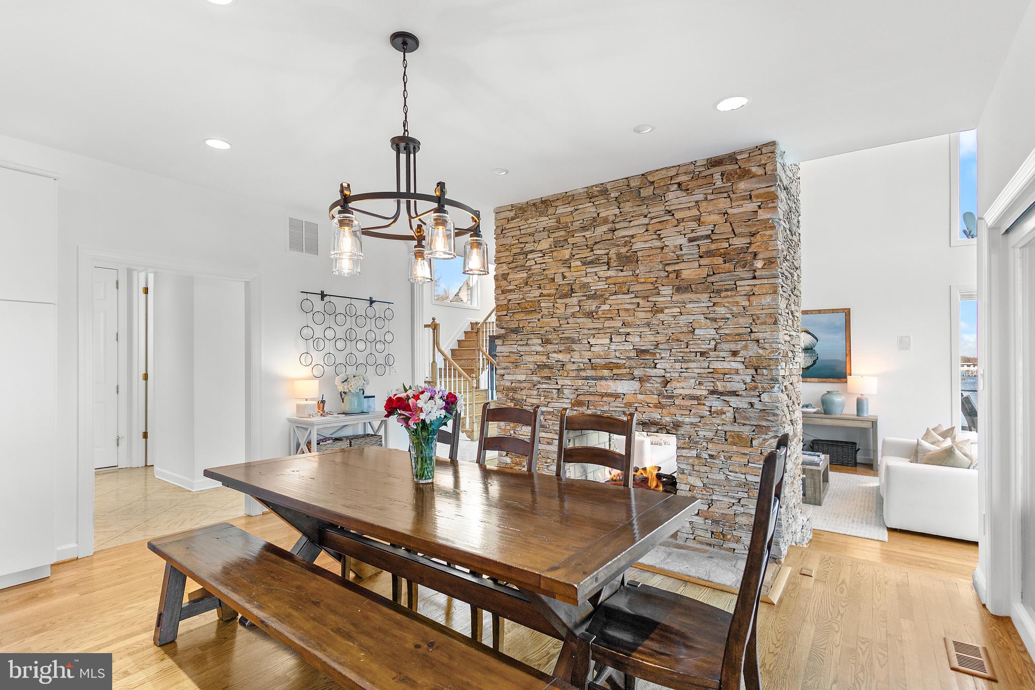 610 South River Landing Road Edgewater, MD 21037 - Photo 15 of 39 a dining room with furniture and wooden floor