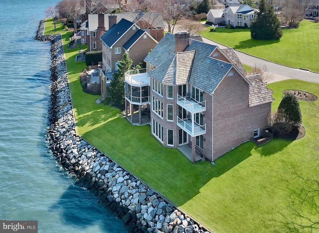 610 South River Landing Road Edgewater, MD 21037 - Photo 2 of 39 a view of a house with a yard and sitting area