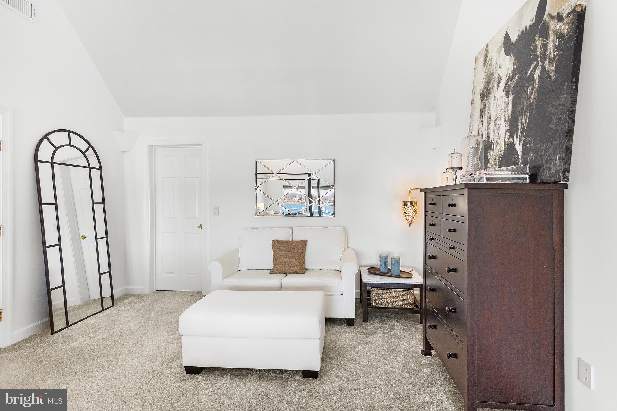 610 South River Landing Road Edgewater, MD 21037 - Photo 24 of 39 a bedroom with a bed and a painting on the wall