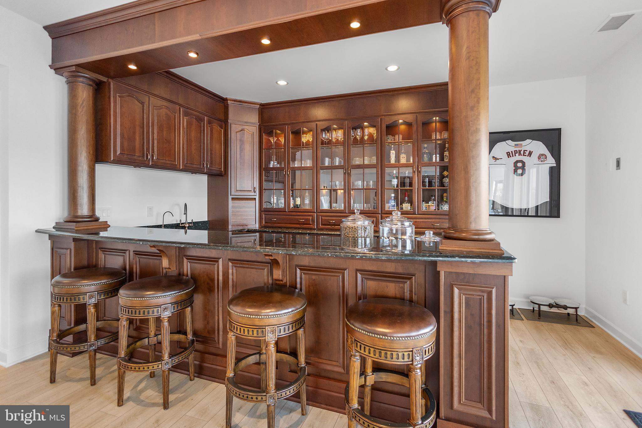 610 South River Landing Road Edgewater, MD 21037 - Photo 29 of 39 a kitchen with a table and chairs in it