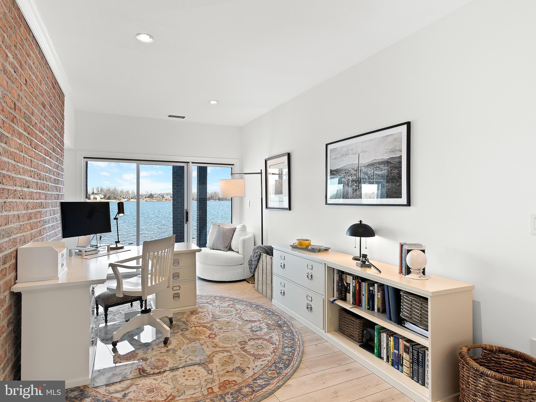 610 South River Landing Road Edgewater, MD 21037 - Photo 32 of 39 a living room with furniture and a flat screen tv