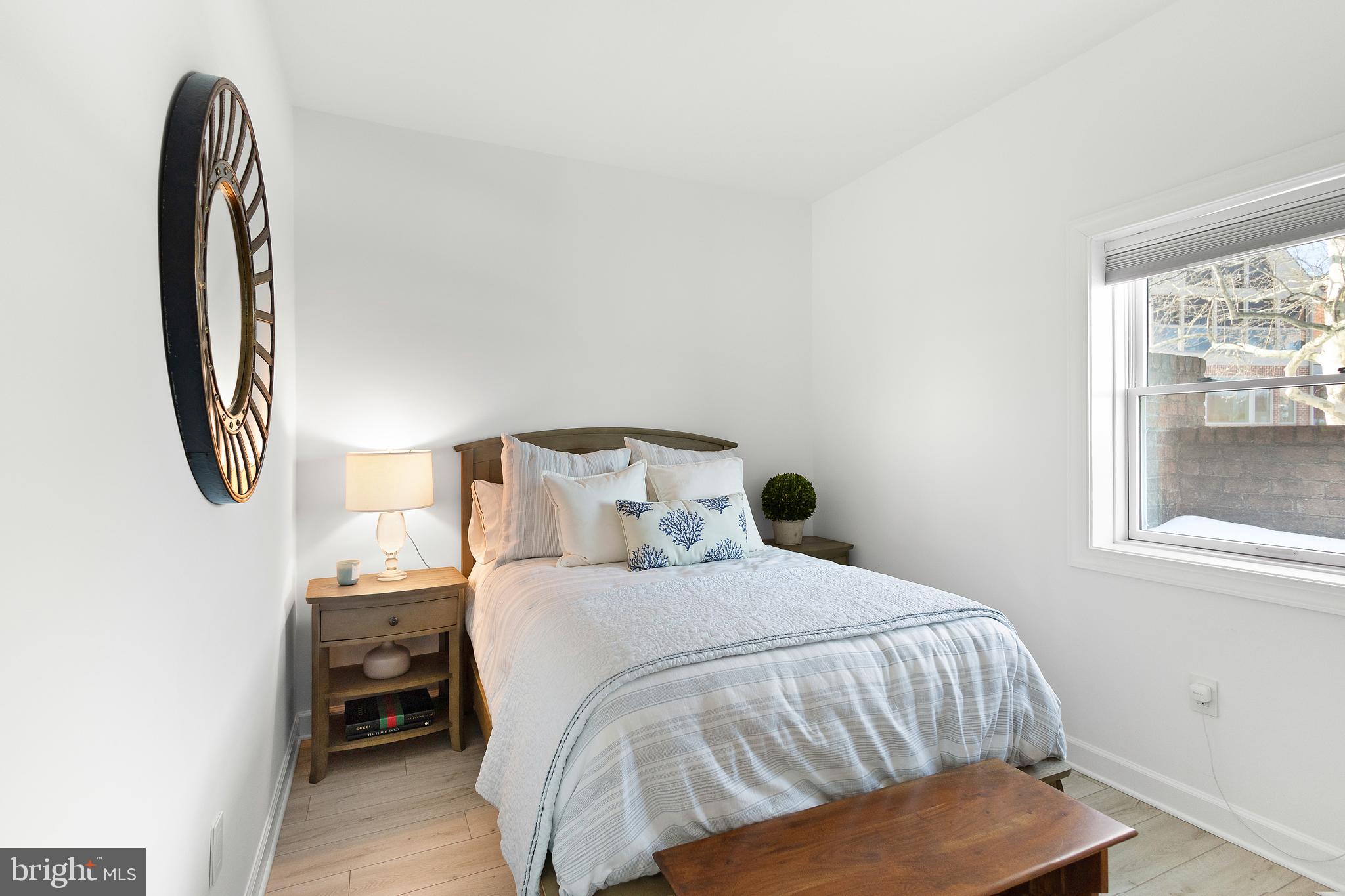 610 South River Landing Road Edgewater, MD 21037 - Photo 33 of 39 a bedroom with a bed and a window