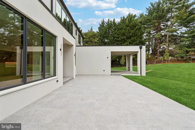 a view of a house with a swimming pool
