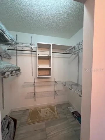 a view of swimming pool with outdoor seating and plants