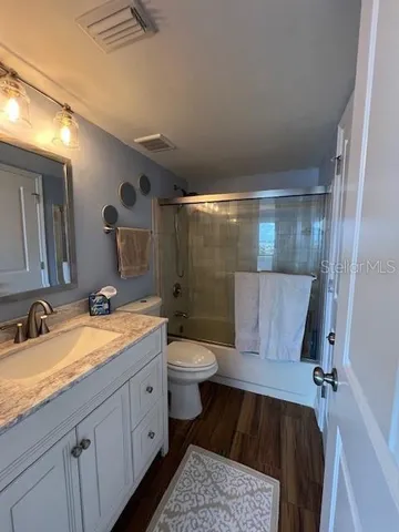 a view of outdoor space with garden and trees