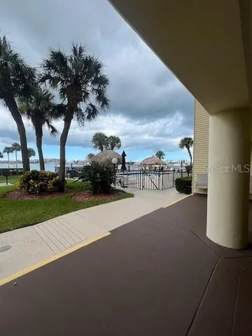 a view of street with tall buildings