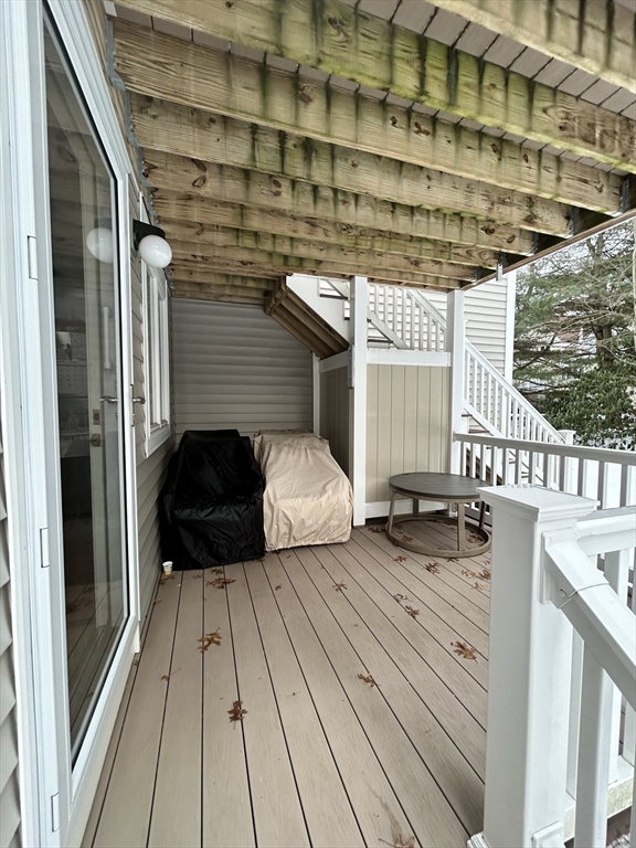 2205 Boston Road, Unit E43 Wilbraham, MA 01095 - Photo 18 of 22 a bedroom with a bed and a window with balcony view