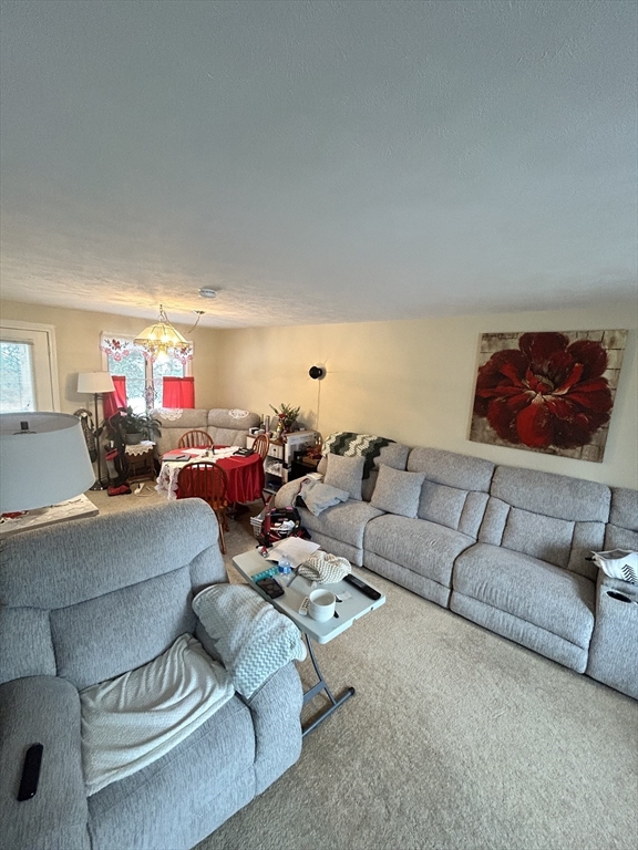 2205 Boston Road, Unit E43 Wilbraham, MA 01095 - Photo 8 of 22 a living room with furniture and a couch