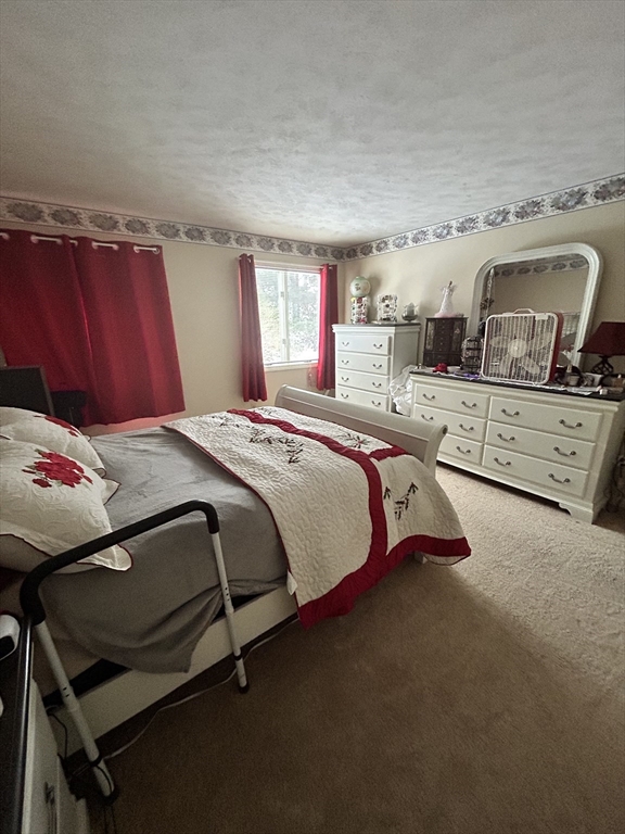 2205 Boston Road, Unit E43 Wilbraham, MA 01095 - Photo 9 of 22 a bedroom with a bed and window