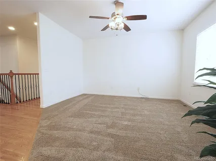 a view of a workspace with furniture