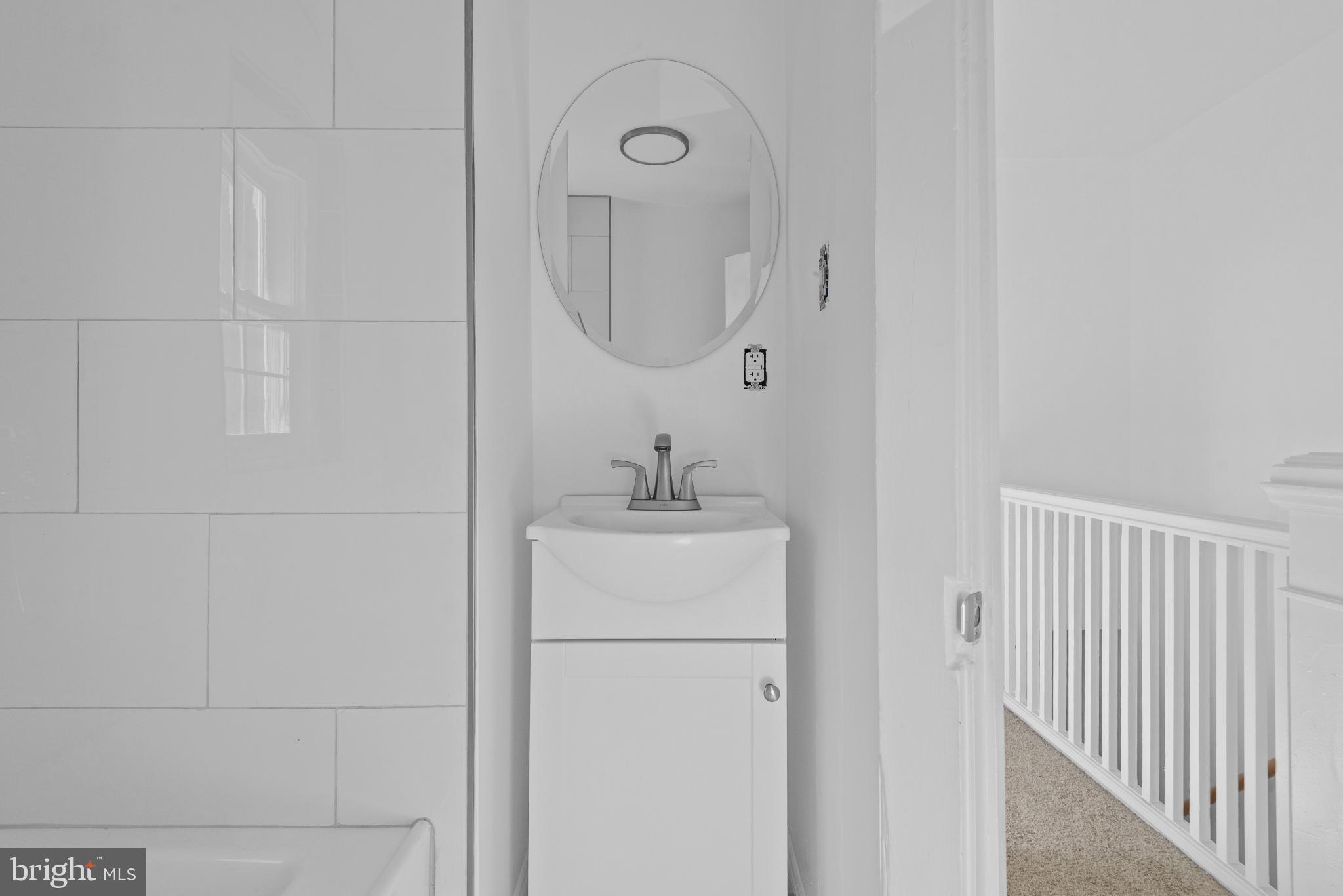 567 South Christian Street Lancaster, PA 17602 - Photo 28 of 43 Sleek, modern bathroom with minimalist design.