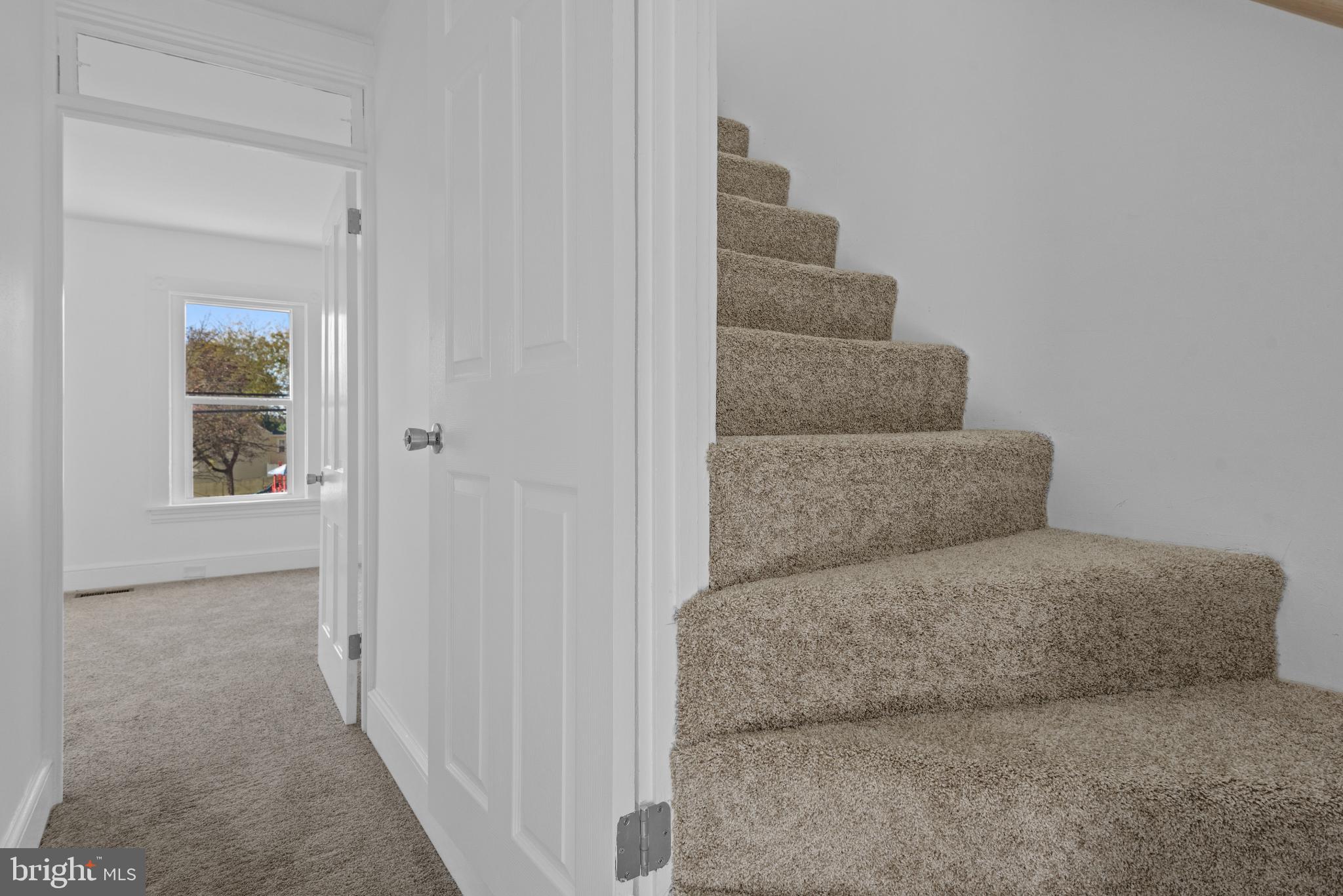 567 South Christian Street Lancaster, PA 17602 - Photo 30 of 43 Bright, inviting entryway with cozy stairs.