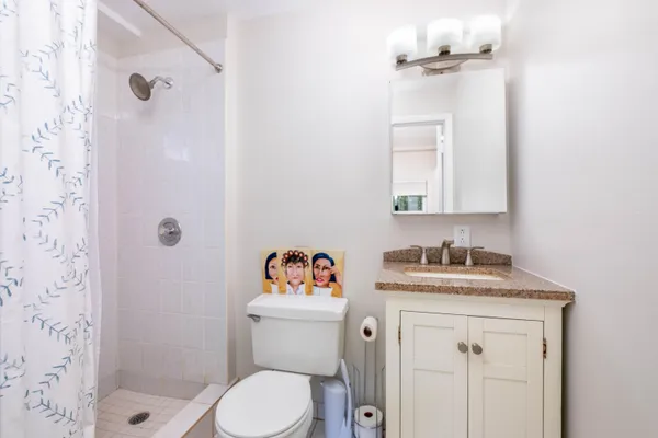 a view of a park with swings and slides