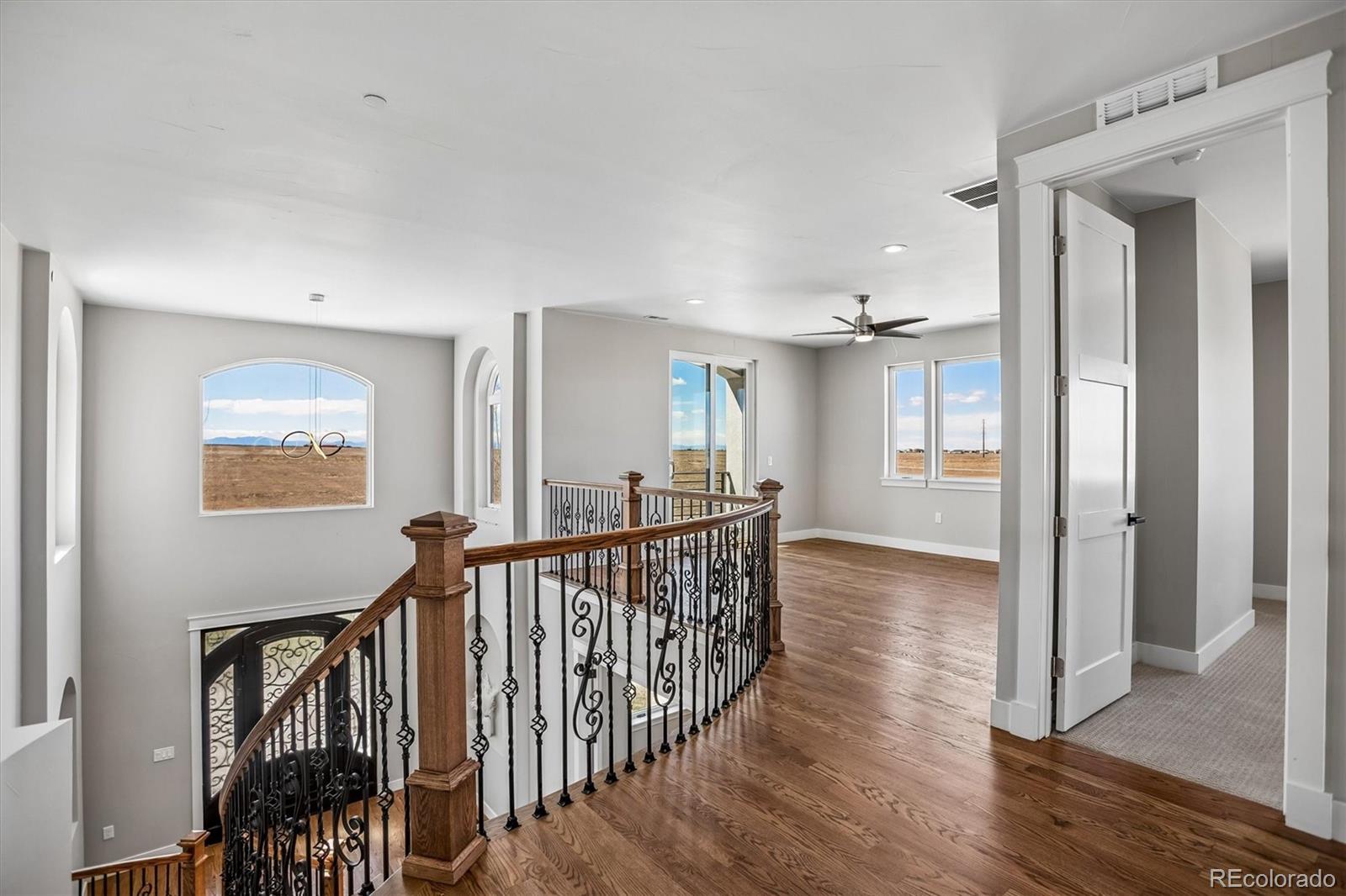 13350 Imboden Road Hudson, CO 80642 - Photo 15 of 50 a view of entryway and hall with wooden floor