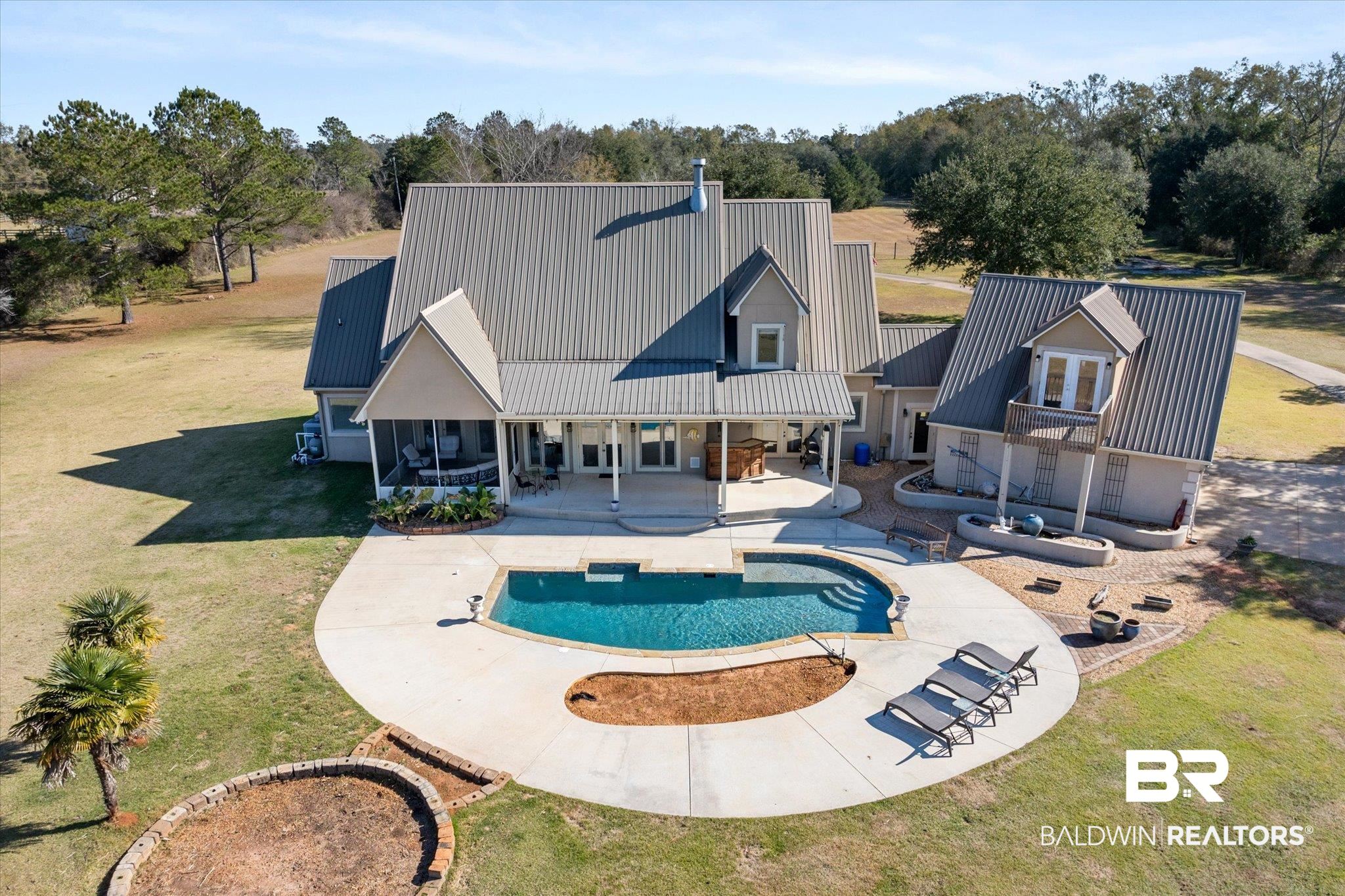 15635 County Road 83 Elberta, AL 36530 - Photo 50 of 54 View of swimming pool with a lawn and a patio area