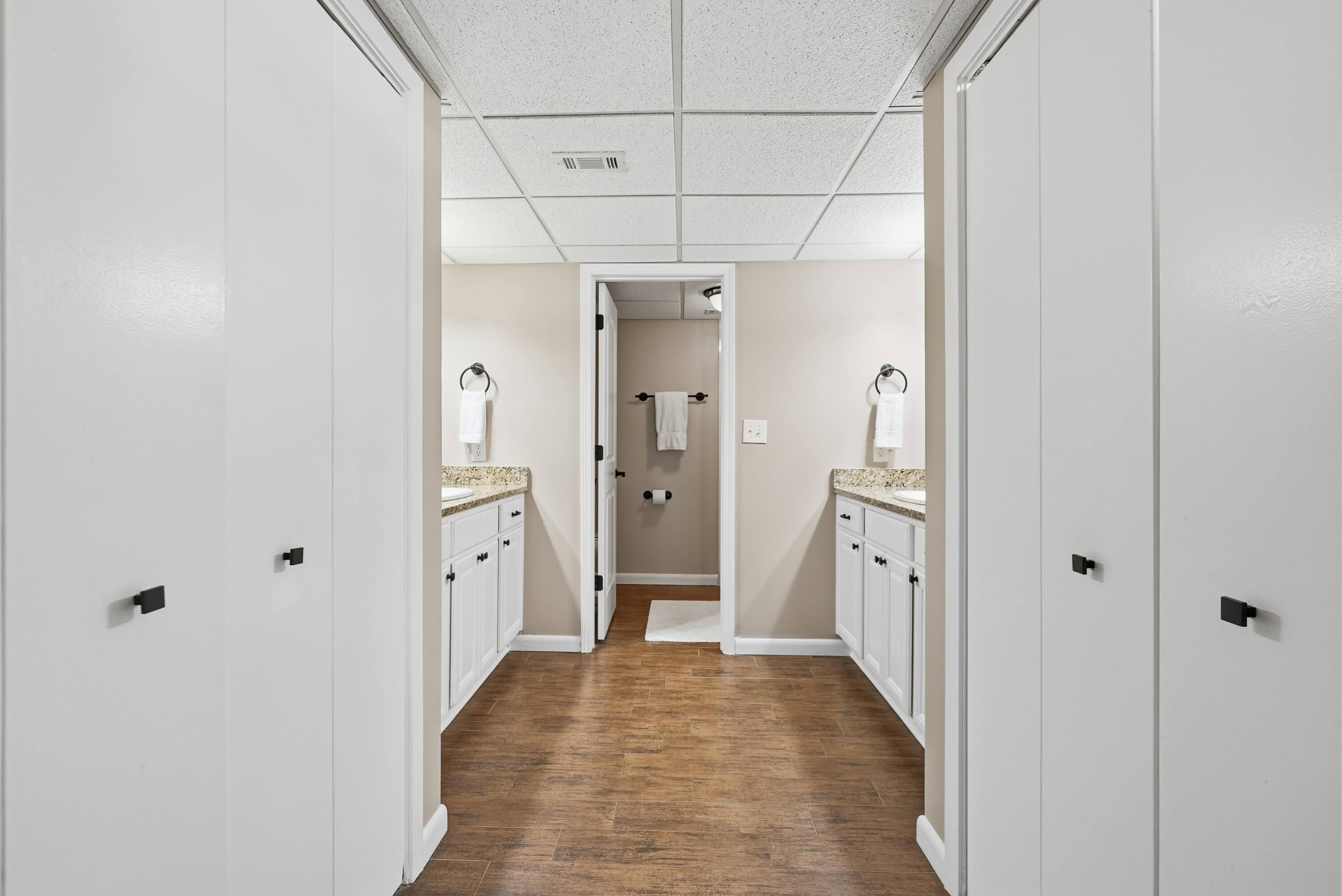 11619 Front Beach Road, Unit 212 Panama City Beach, FL 32407 - Photo 21 of 63 a view of a bathroom with a shower and a sink