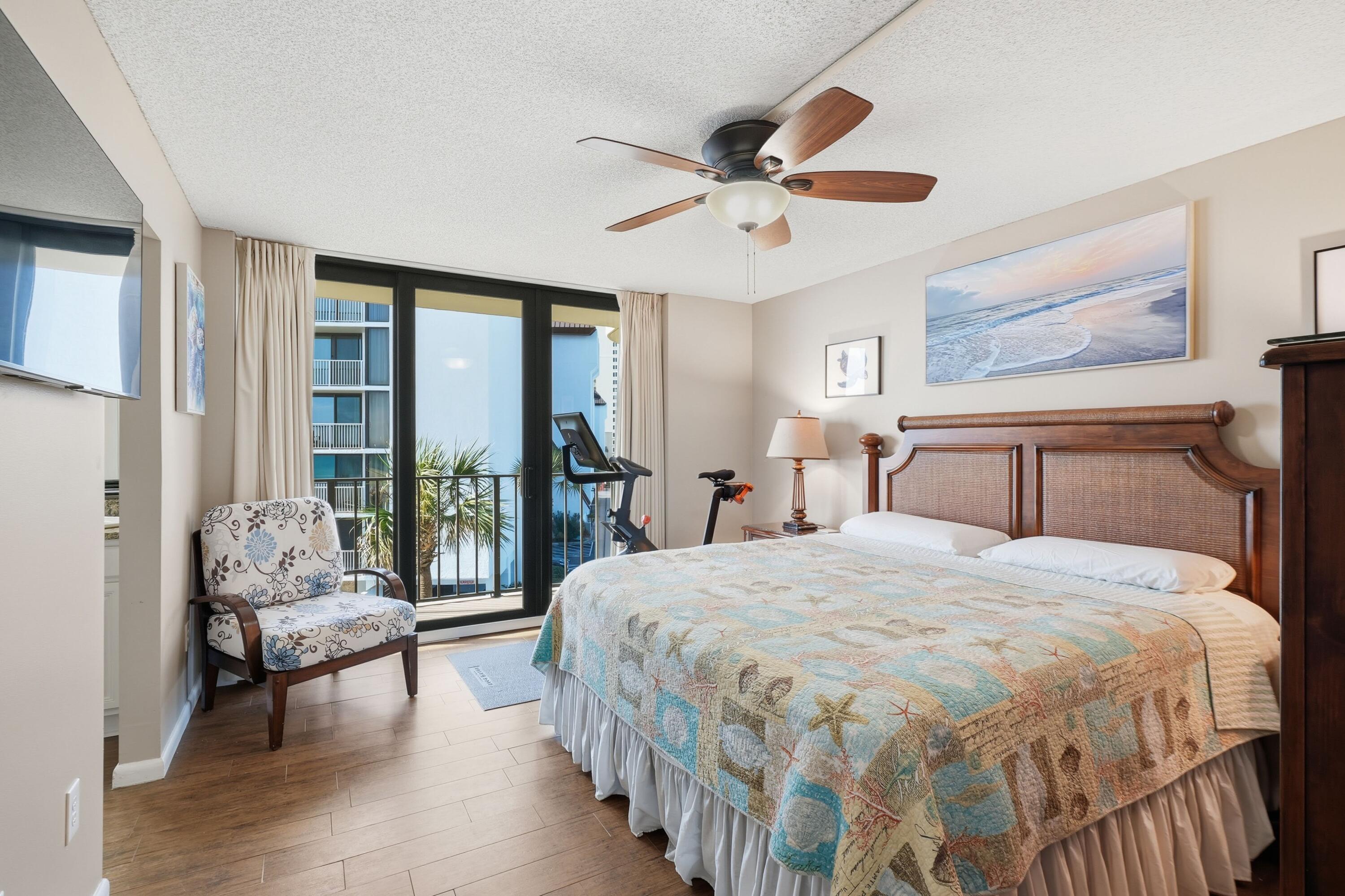 11619 Front Beach Road, Unit 212 Panama City Beach, FL 32407 - Photo 24 of 63 a bedroom with a bed and a large window