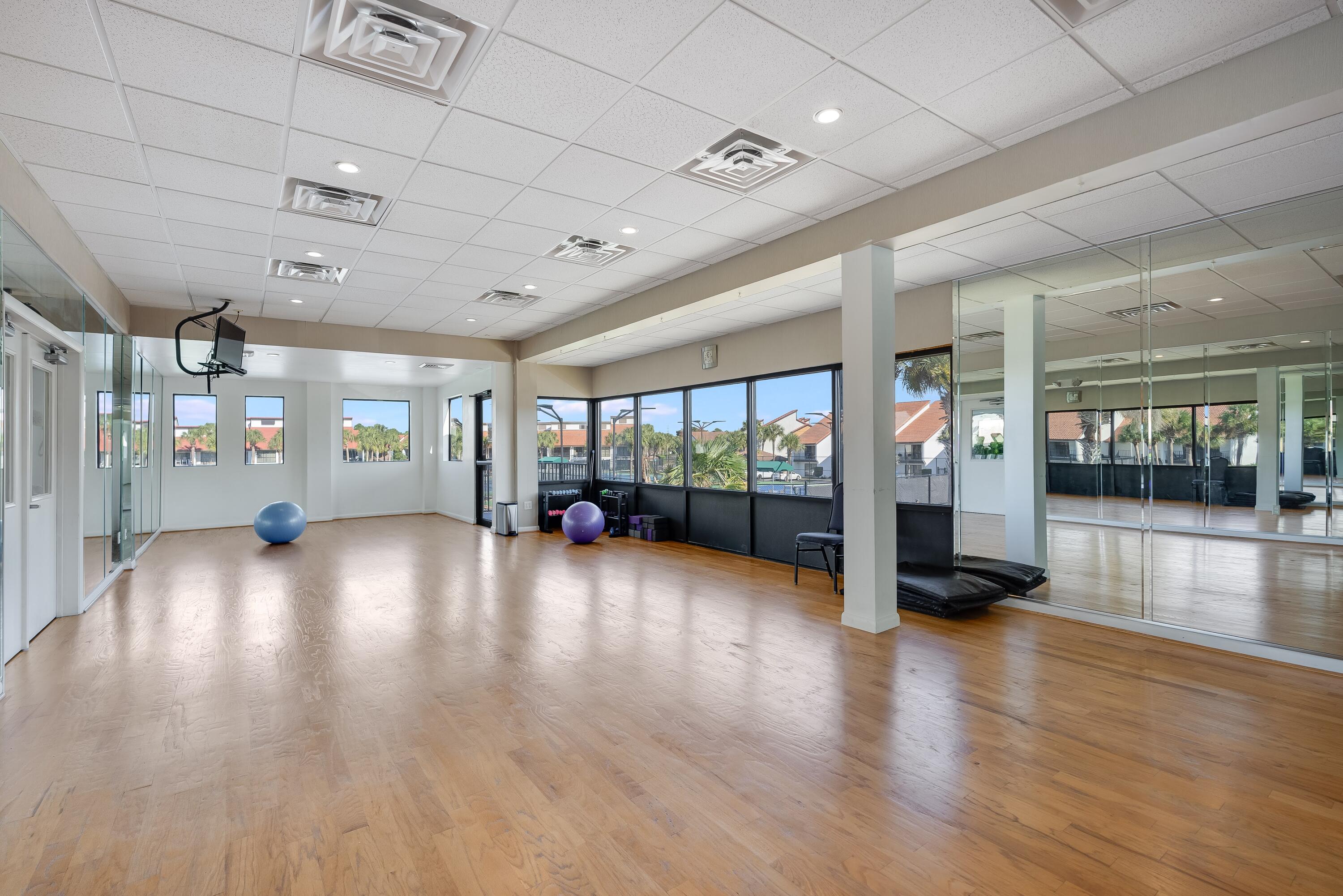 11619 Front Beach Road, Unit 212 Panama City Beach, FL 32407 - Photo 55 of 63 a view of an empty room with glass door