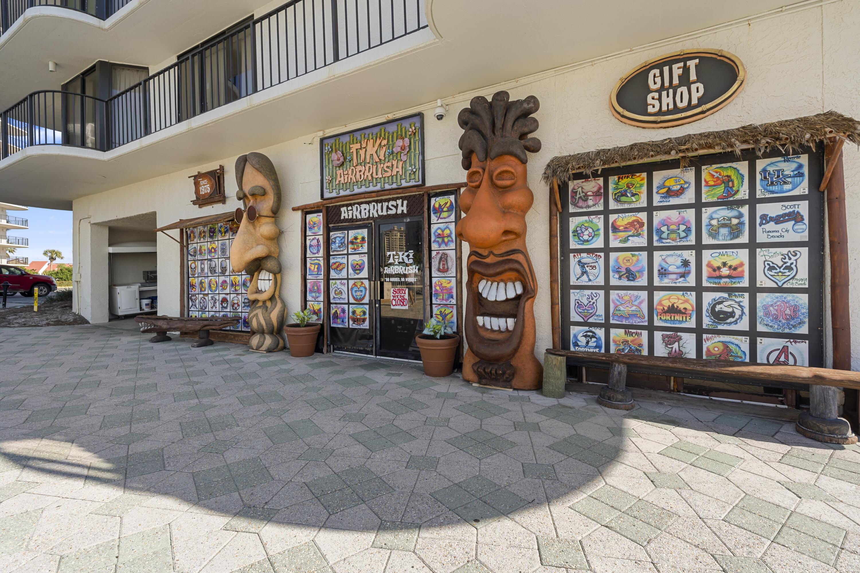 11619 Front Beach Road, Unit 212 Panama City Beach, FL 32407 - Photo 56 of 63 a view of a room with lots of windows and furniture