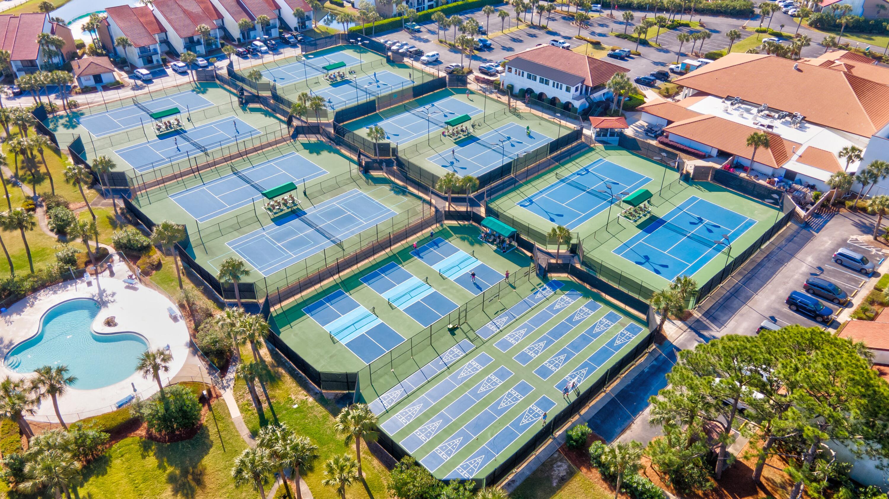 11619 Front Beach Road, Unit 212 Panama City Beach, FL 32407 - Photo 58 of 63 an aerial view of a building with parking