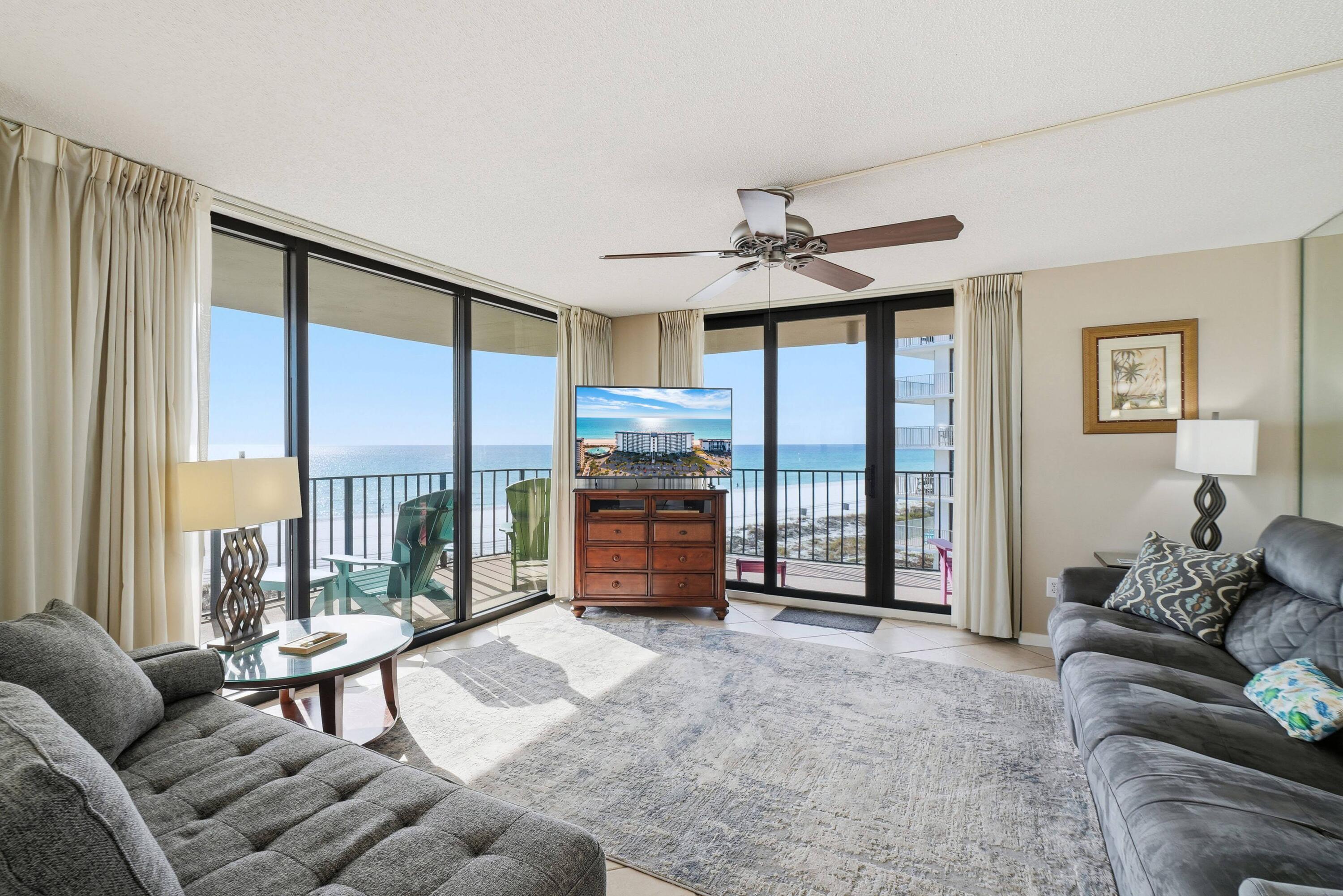 11619 Front Beach Road, Unit 212 Panama City Beach, FL 32407 - Photo 6 of 63 a living room with furniture and a large window