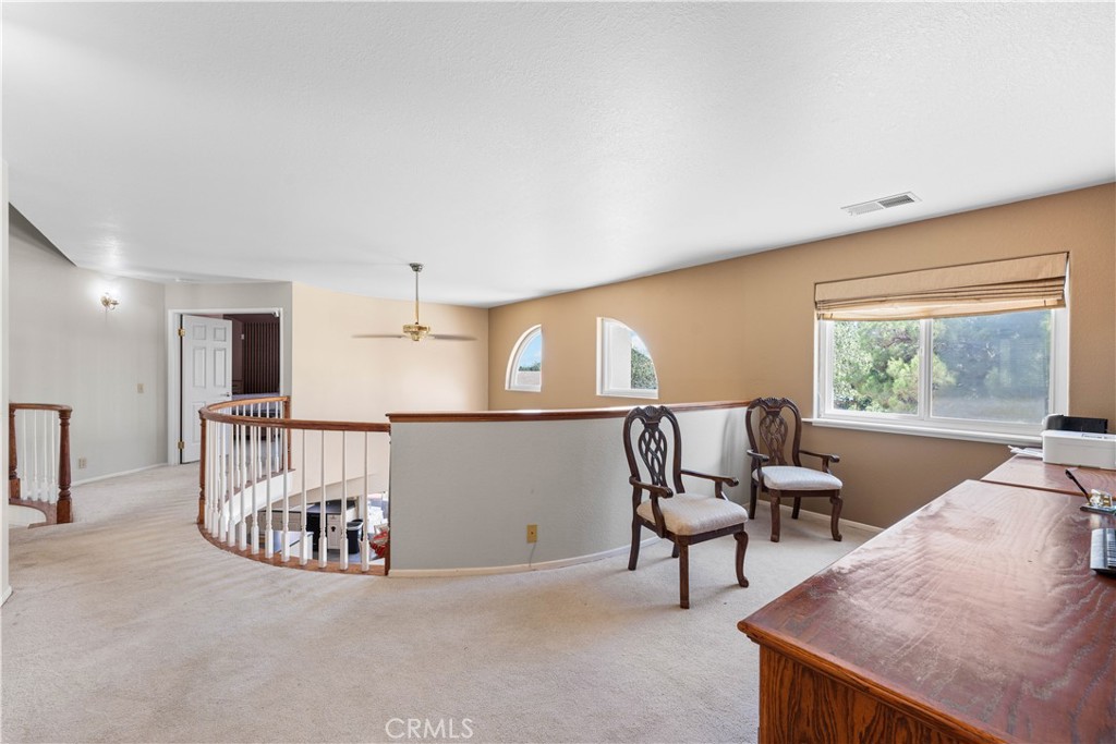 41058 Carmel Road Palmdale, CA 93551 - Photo 31 of 68 a view of a livingroom with furniture and windows