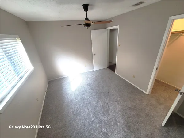 a view of a window in an empty room